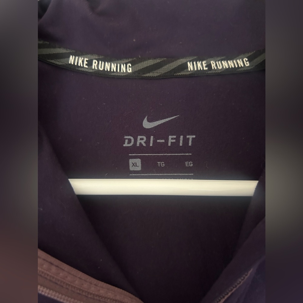 Gently used Nike Dri-Fit with finger holes!